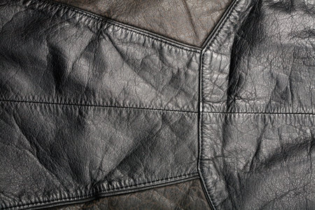 Scratched worn leather texture with seam    の写真素材