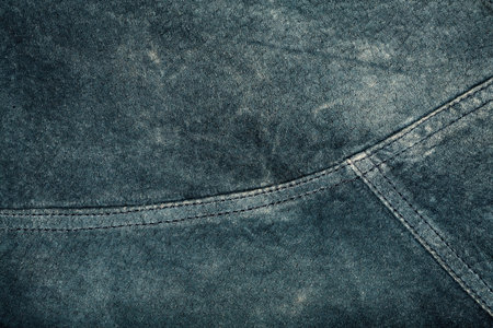 Scratched worn suede texture with seam   の写真素材