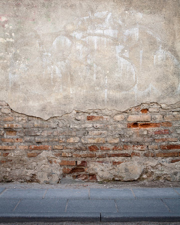 Aged weathered street wall backgroundの写真素材