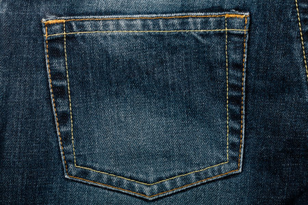 Blue jeans fabric with back pocket background  