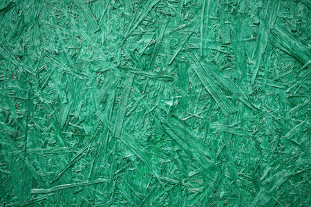 Close up shot of a plywood painted in green の写真素材