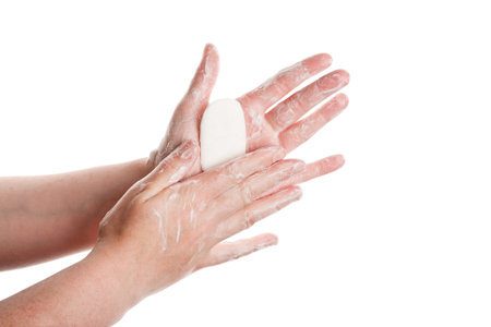 Washing female hands isolated on white background   