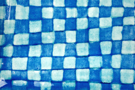 Closeup shot of glazed in blue clay potteryの写真素材