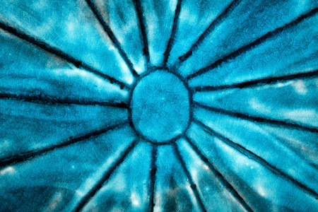 Closeup shot of glazed in blue clay potteryの写真素材