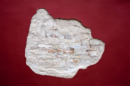 Detail of an old cracked cement wall texture  