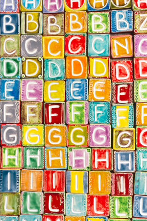 Background from colorful handmade ceramic letters   の写真素材