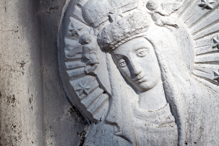 Bas relief of Virgin Mary at Rasu cemetery in Vilnius, Lithuaniaの写真素材