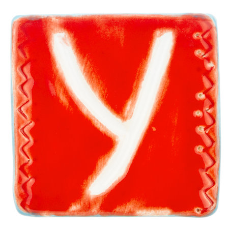 Big size colorful handmade ceramic letter isolated on white backgroundの写真素材