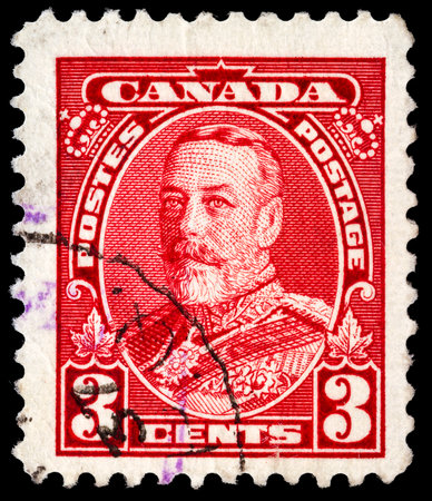CANADA - CIRCA 1935: A stamp printed in Canada shows King George V in Uniform, circa 1935. のeditorial素材