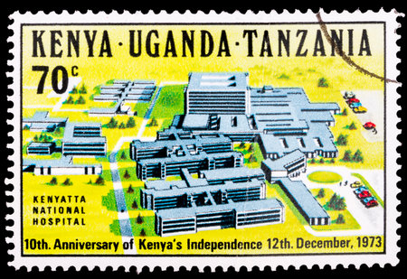 KENYA - CIRCA 1973: A stamp printed in Kenya shows 10th Anniversary of Kenyas Independence 12th December, 1973, Kenyatta National Hospital, circa 1973.のeditorial素材