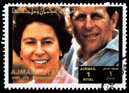 AJMAN - CIRCA 1973: stamp printed by Ajman shows Queen Elizabeth and Prince Philip Mountbatten, circa 1973 のeditorial素材