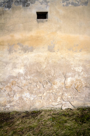 Aged weathered beige wall background の写真素材