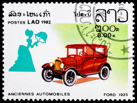 LAOS - CIRCA 1982: A stamp printed in Laos shows Ford automobile, 1925, circa 1982 のeditorial素材