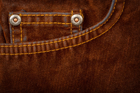 Brown jeans texture with a pocketの写真素材