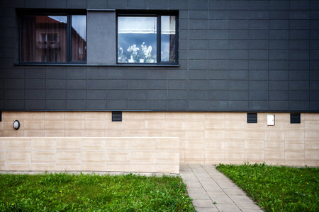 Modern tile wall with some windowsの写真素材