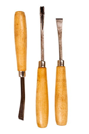 Three used chisels isolated on white background.