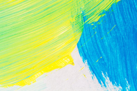 Abstract hand painted blue and yellow colors art backgroundの写真素材