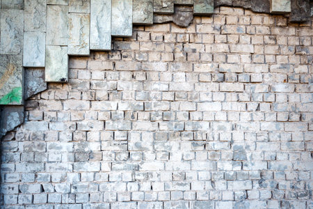 White brick and stone tole wall texture backgroundの写真素材