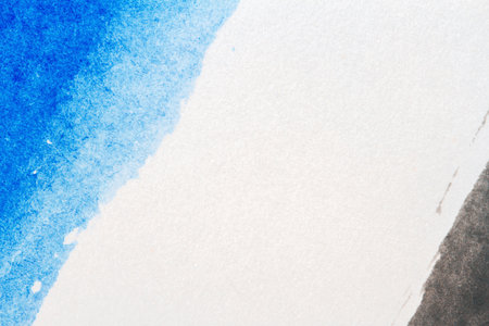 Abstract hand painted blue and black art backgroundの写真素材