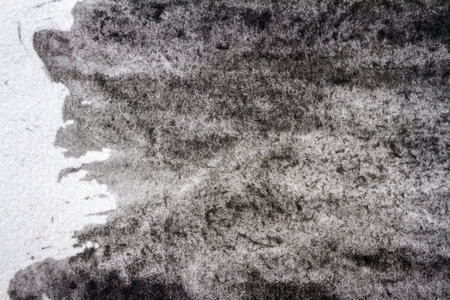 Abstract hand painted black and white watercolor arts backgroundの写真素材