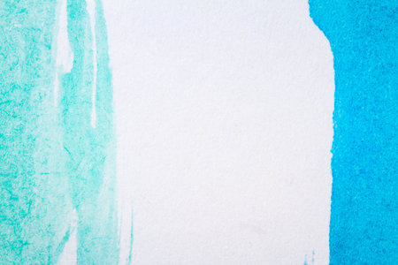 Abstract hand painted blue and green art backgroundの写真素材