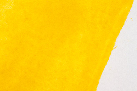 Abstract hand drawn yellow watercolor paints backgroundの写真素材