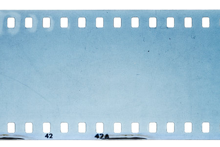 Blank noisy scratched filmstrip isolated on white backgroundの写真素材