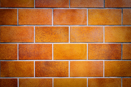 Detail of brown tile wall texture background