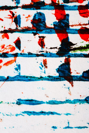 Abstract hand painted lined blue and red acrylic art background on paper textureの写真素材