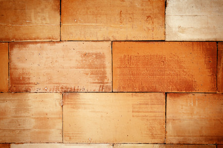Detail of brown tile wall texture background