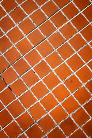 Detail of brown tile wall texture backgroundの写真素材