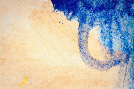 Macro shot of abstract hand drawn blue and brown watercolor paints backgroundの写真素材