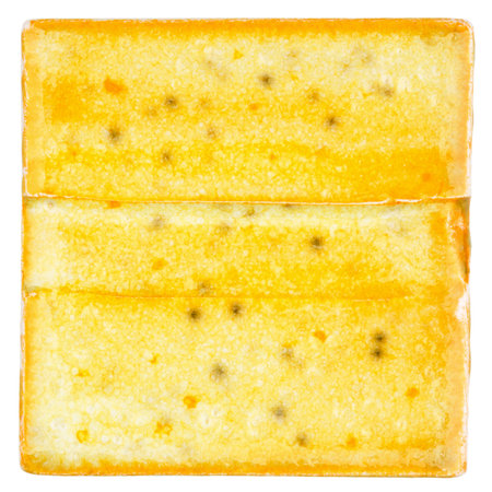 Yellow lined handmade glazed ceramic tile isolated on white background