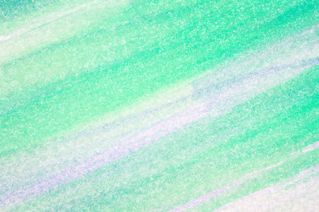 Macro shot of abstract hand drawn blue and green watercolor paints background
