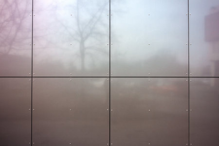 Detail of dark brown tile wall texture background