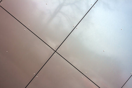 Detail of dark brown tile wall texture backgroundの写真素材