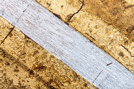 Silver with golden bumpy wall stucco texture background