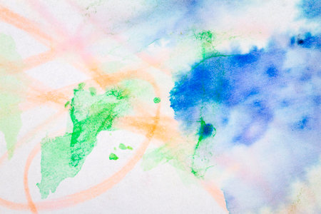 Macro shot of abstract hand drawn colorful watercolor paints background. Stained textureの写真素材