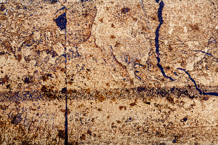 Golden messy wall stucco texture background. Decorative wall paint.