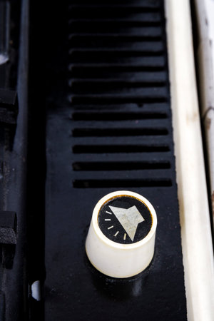 Volume knob of vintage suitcase turntable. Closeup imageの写真素材