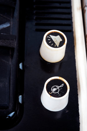 Volume and tone knobs of vintage suitcase turntable. Closeup imageの写真素材