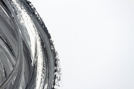 Abstract brushed black and white hand painted acrylic background, creative abstract hand painted background, close-up fragment of acrylic painting on paper with brush strokesの写真素材