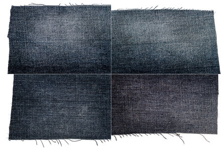 Collection of dark jeans fabric textures isolated on white background. Rough uneven edges. Rectangular composite image of jeans texturesの写真素材