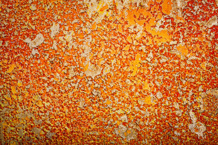 Yellow golden and red messy wall stucco texture background. Decorative wall paint.