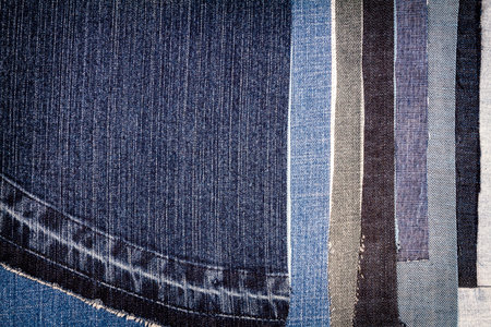 Abstract different torn jeans stripes texture background. Jeans texture. Striped jeans background....