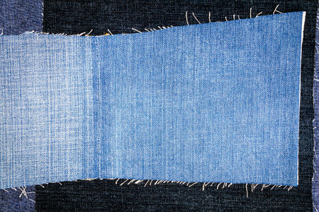 Abstract different torn jeans stripes texture background. Jeans texture. Striped jeans background. Denim jeans texture.の写真素材