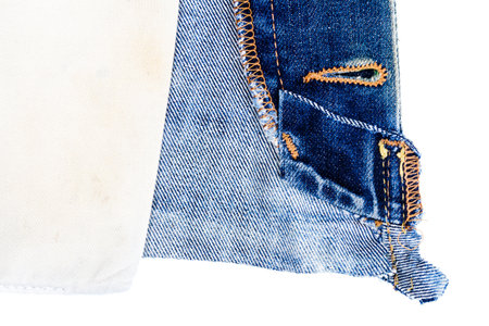 Closeup of jeans fabric with side pocket background. Jeans detail. Blue jeans texture background....