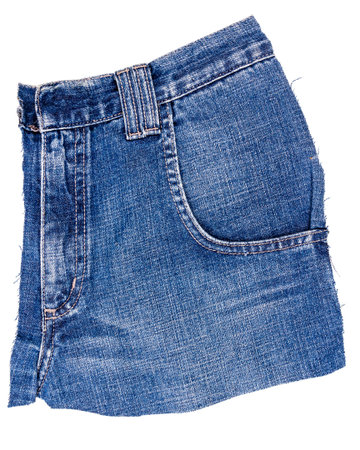 Piece of blue jeans fabric with a side pocket isolated on white background. Rough uneven edges. Denim jeans tornの写真素材