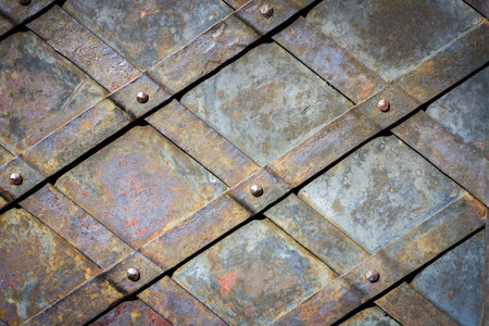 Close up of ancient iron door. Decorative pattern of the old iron door.の写真素材