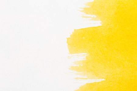 Abstract hand drawn yellow watercolor paints backgroundの写真素材